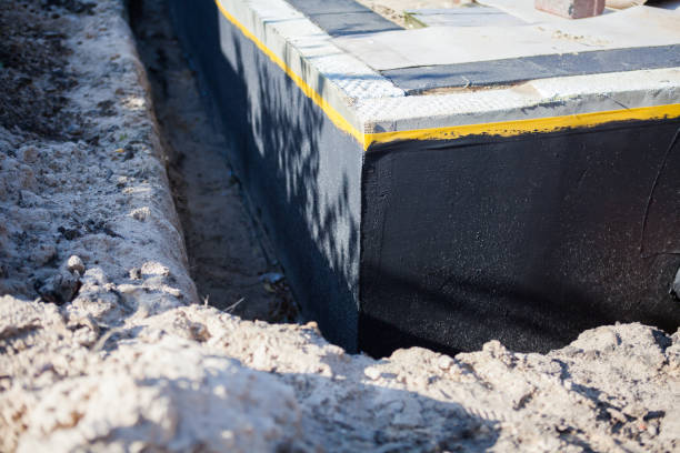 Professional Emergency Waterproofing technician working in Weston, WI